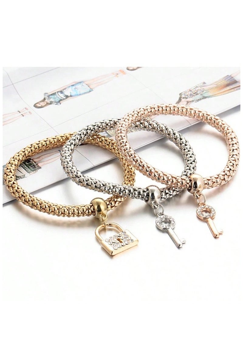 Women's accessory – a set of 3 bracelets in different colors with lock and key charms. Perfect as a gift for birthdays, graduations, Valentine's Day, and all special occasions.  - Image 4
