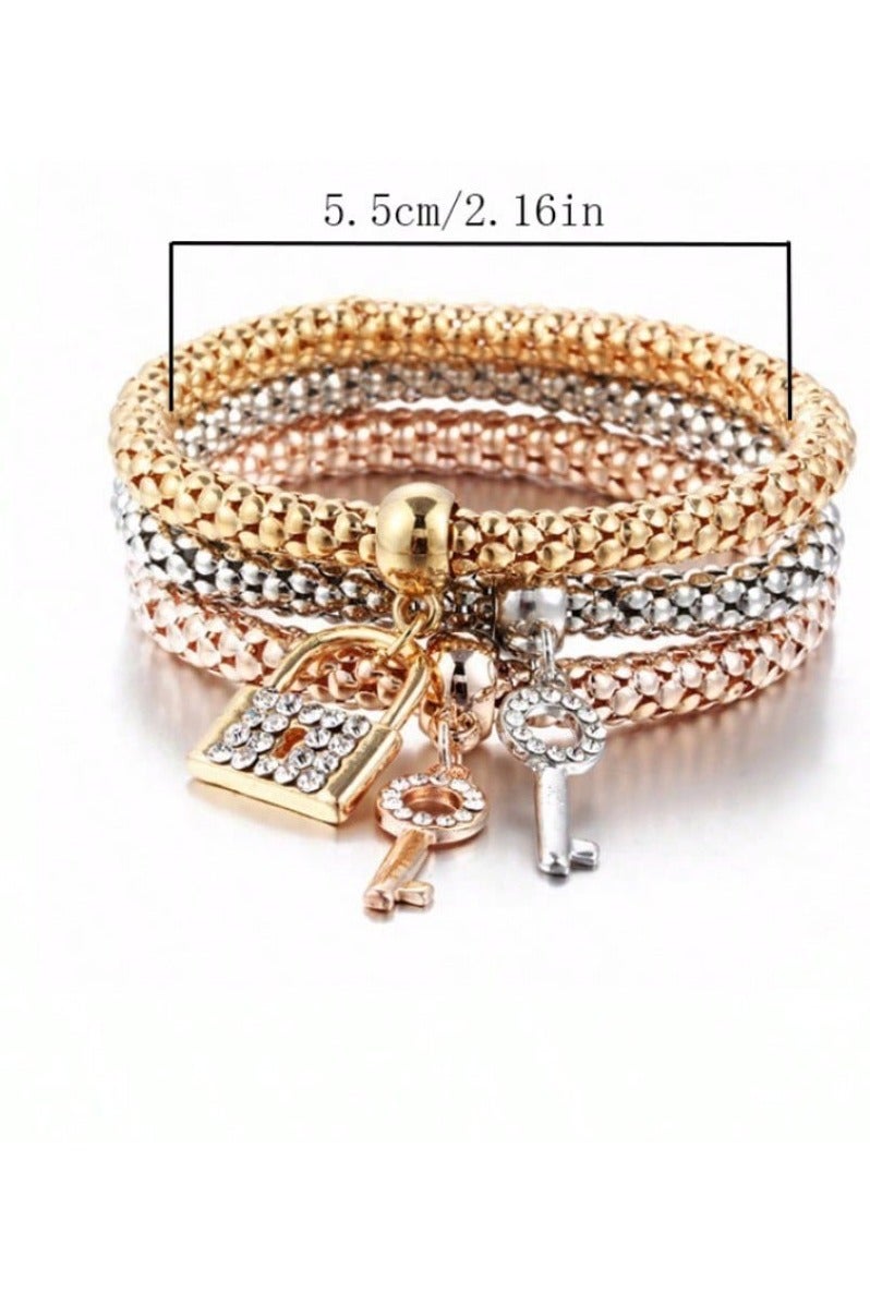 Women's accessory – a set of 3 bracelets in different colors with lock and key charms. Perfect as a gift for birthdays, graduations, Valentine's Day, and all special occasions.  - Image 5
