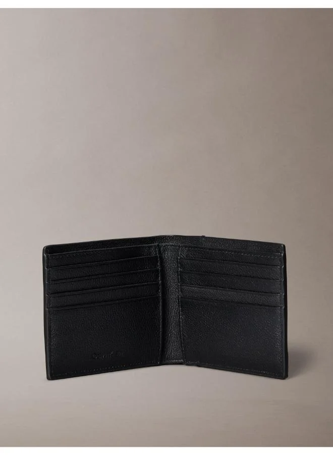CALVIN KLEIN  Emblem AOP Embossed East-West Billfold for Men | Best Price UAE