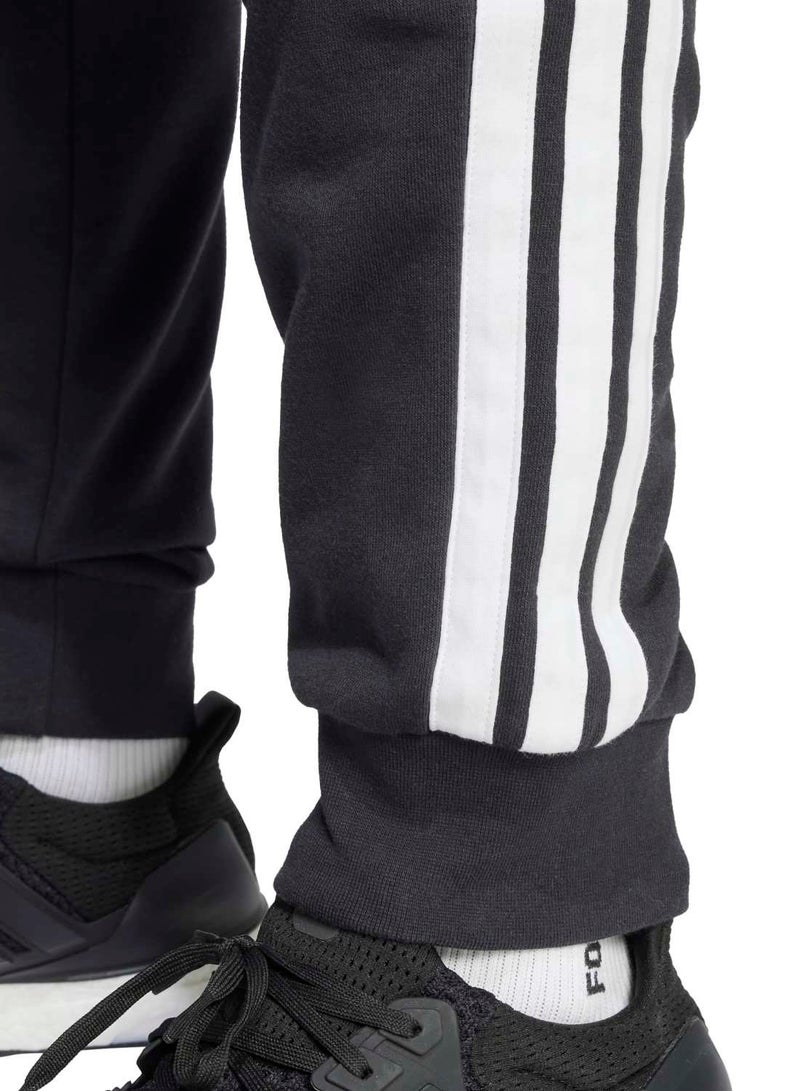 Adidas Essentials Three Stripes French Terry Pants - Image 4