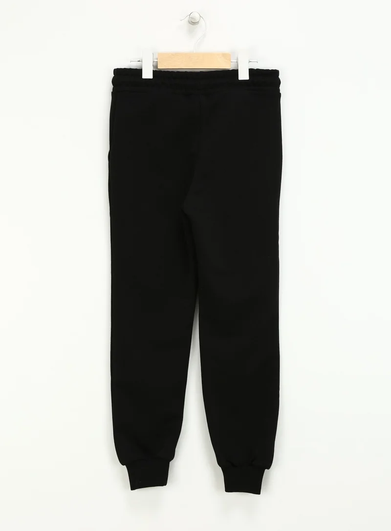Haribo Elastic Leg Black Boys' Sweatpants HRBTXT700 Kids Sweatpants