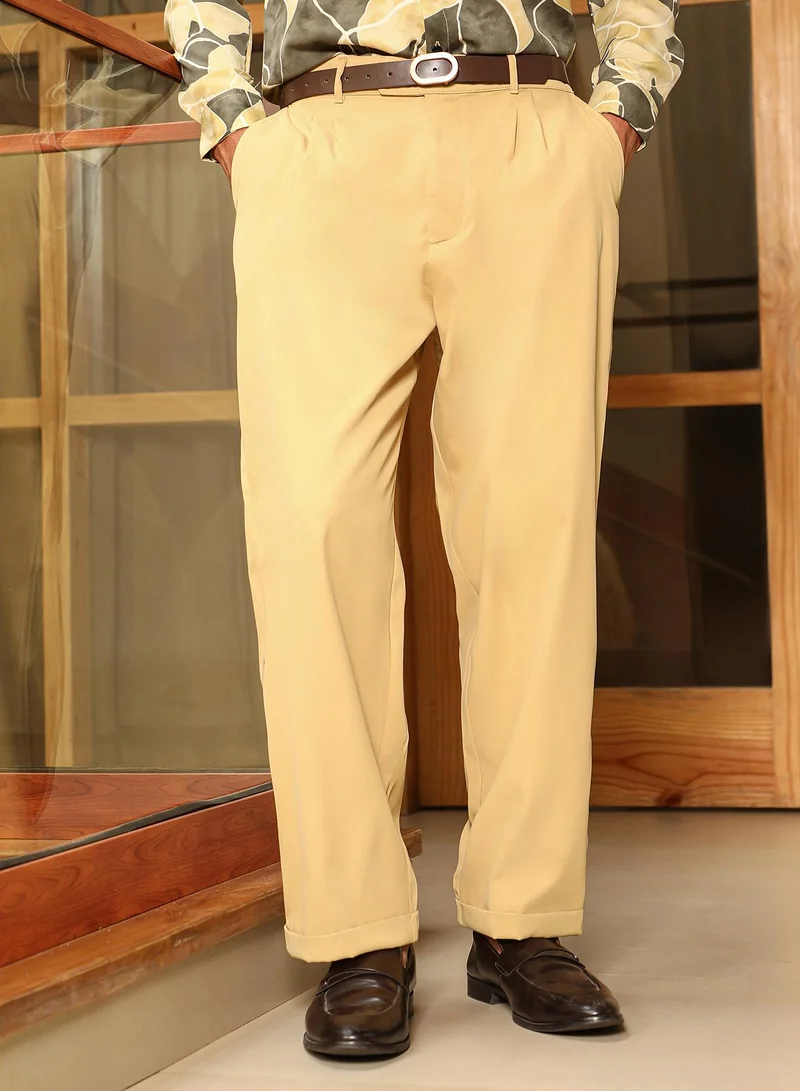Campus Sutra Men Pleated-Twill Tailored Trousers | Mid-Rise , Side Elasticated Stretch Waist | Half-Button , Cuffed-Straight Hem | Solid Twill | Woven Fabric For Casual & Office Wear | Buff Beige