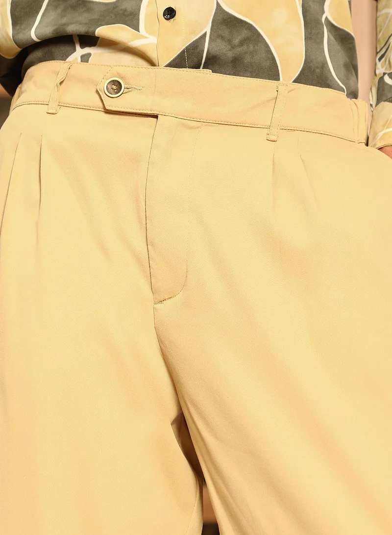 CAHOOT  Men Pleated-Twill Tailored Trousers | Mid-Rise , Side Elasticated Stretch Waist | Half-Button , Cuffed-Straight Hem | Solid Twill | Woven Fabric For Casual & Office Wear | Buff Beige for Men | Best Price UAE