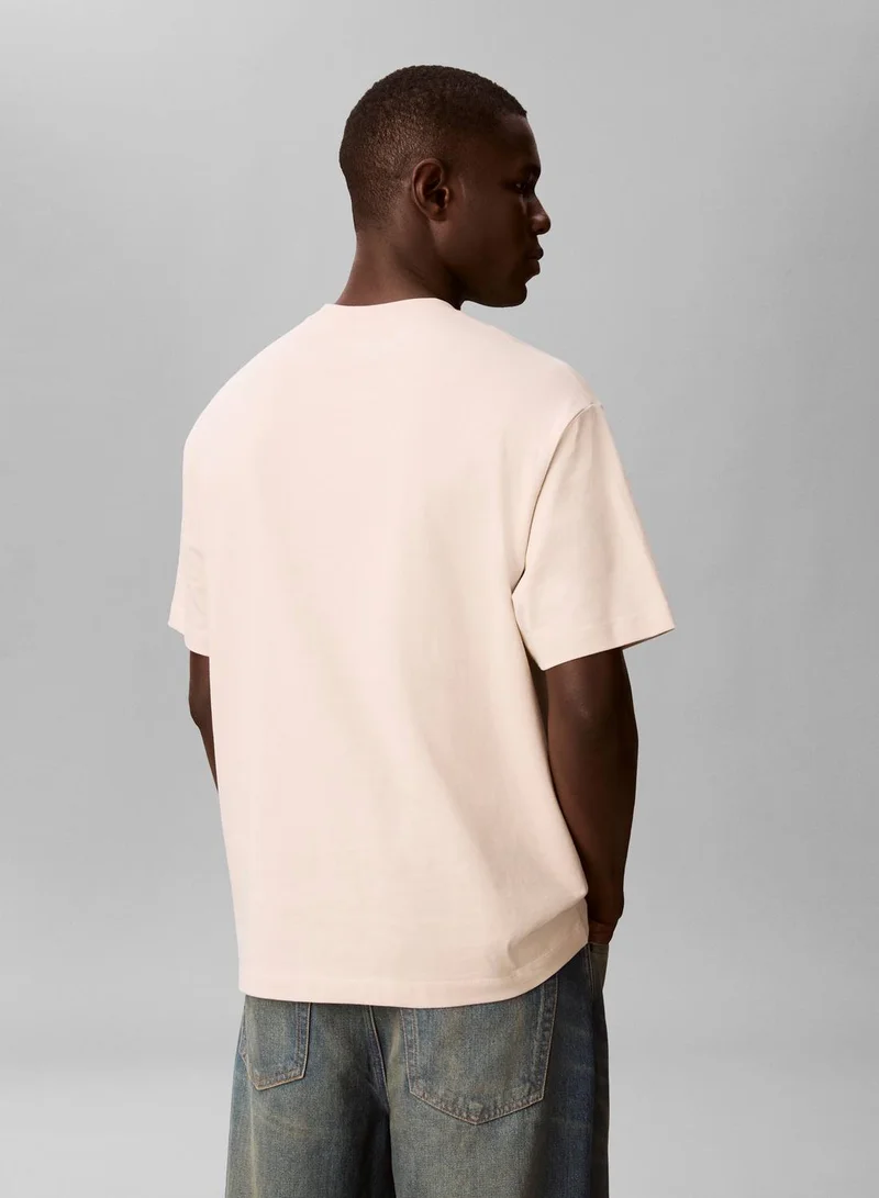 Calvin Klein Jeans Oatmeal Varsity Logo T-Shirt for Men | Best Price UAE