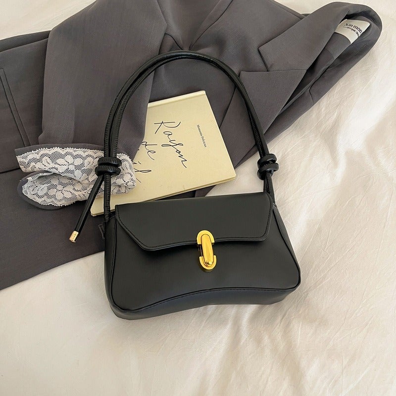 Korean‑style niche, fashionable, minimalist casual bag—2026 spring new arrival, chic lock‑detail tote, trendy shoulder bag. - Image 1