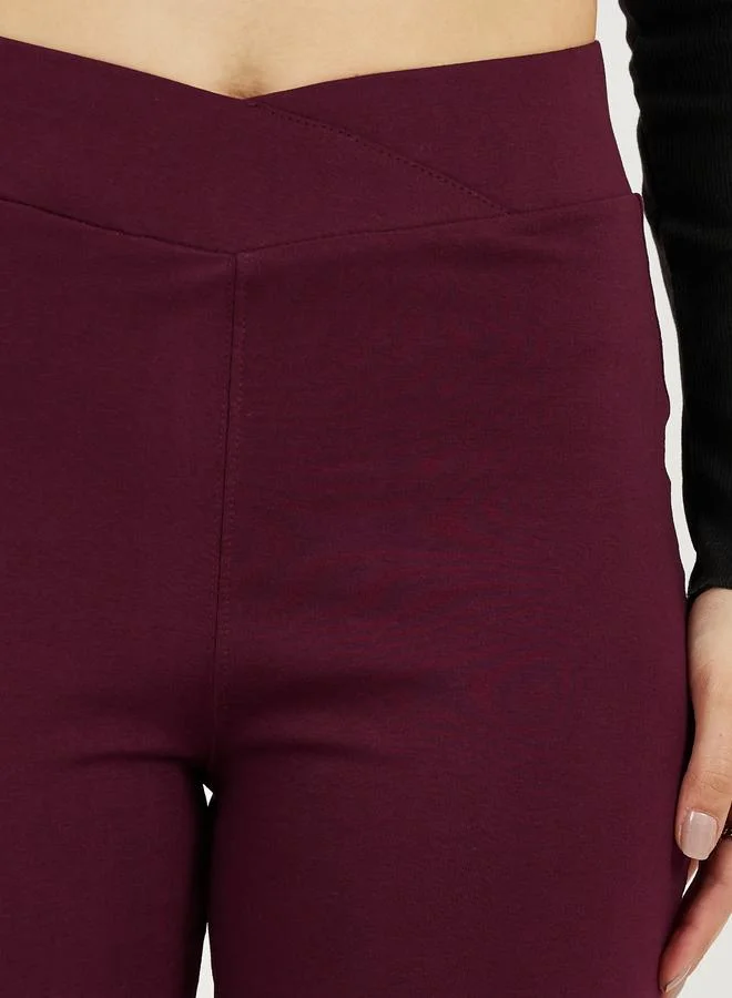 Styli Styli Solid Criss-Cross Waistband Fit and Flare Leggings