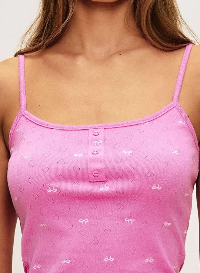 Undiz Cotton pointelle top with knot print