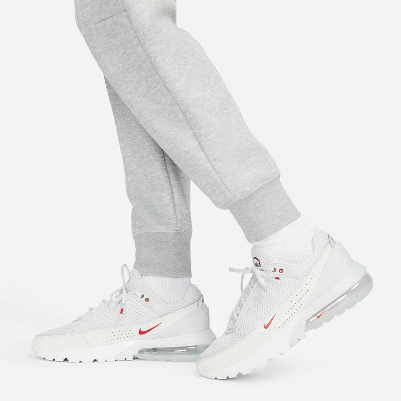 Nike light grey Women's Sportswear Tech Fleece Mid-Rise Joggers for Women | Best Price UAE