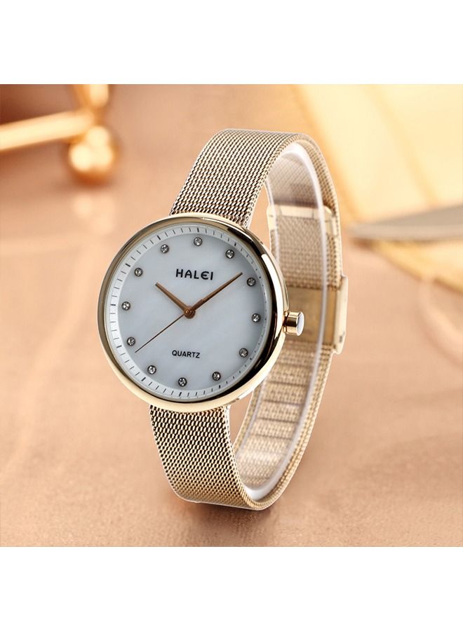 هالي ساعة HALEI Harley نسائية كوارتز 556L - 34ملم ذهبي وأبيض - ميناء شمسي - سوار معادن صلب - مقاوم للماء - Image 3