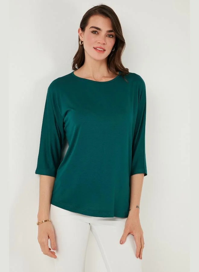 ليلا بلوزة نسائية ليلا بأكمام ترافكار ورقبة دائرية