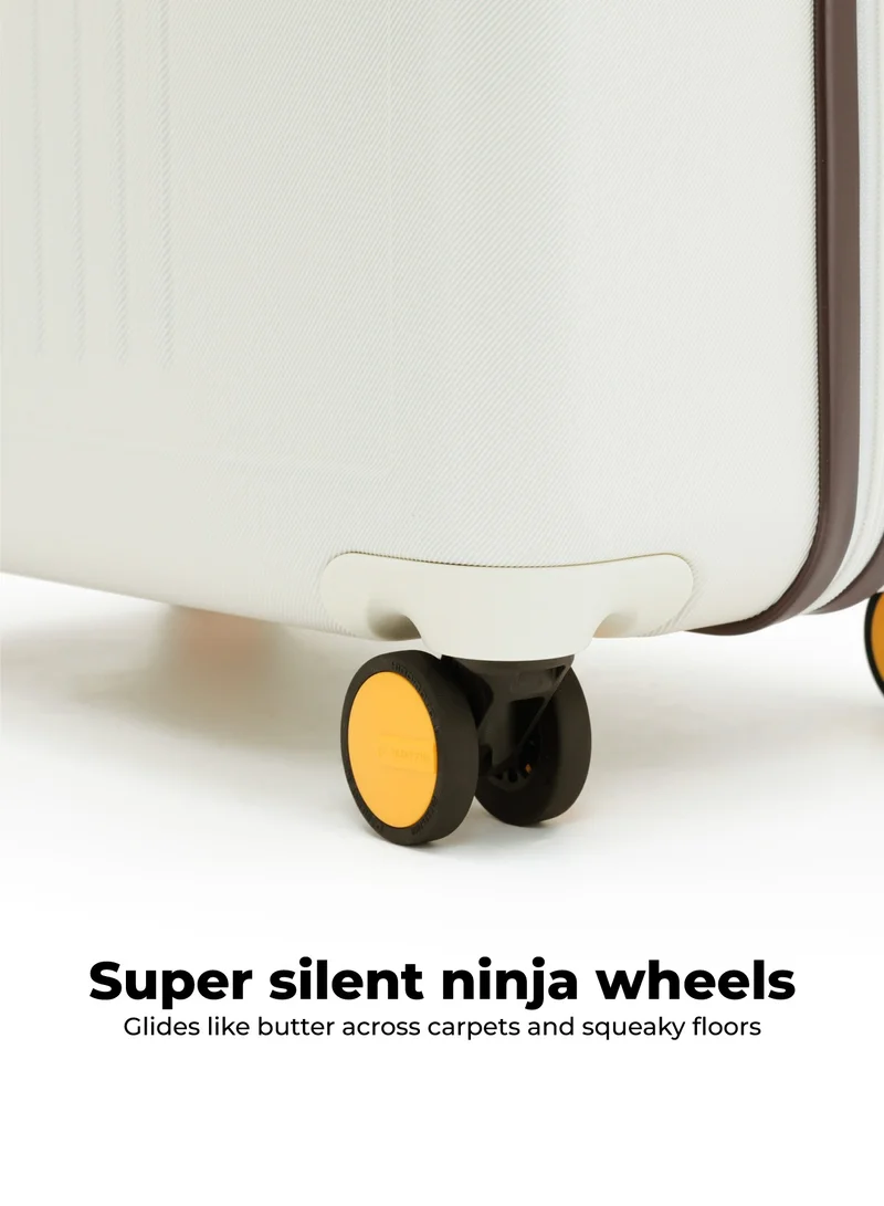 Mokobara The Transit Check-In Luggage - Polycarbonate Material | Still Loading Brownray 2.0, White
