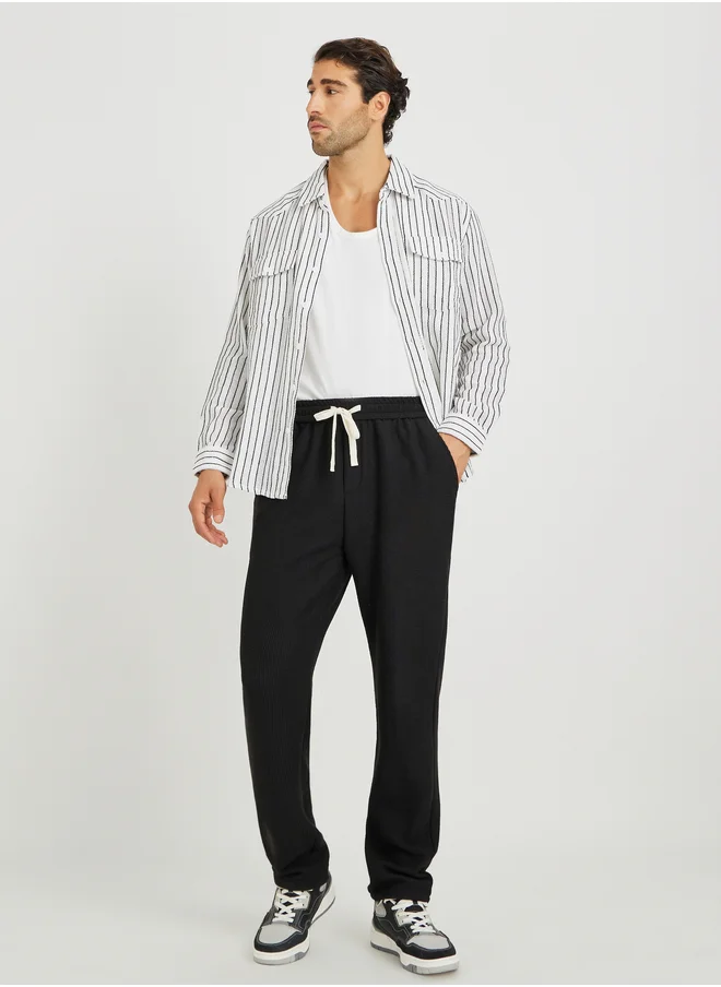 ستايلي Styli Men Textured Straight Fit Joggers with Drawstring