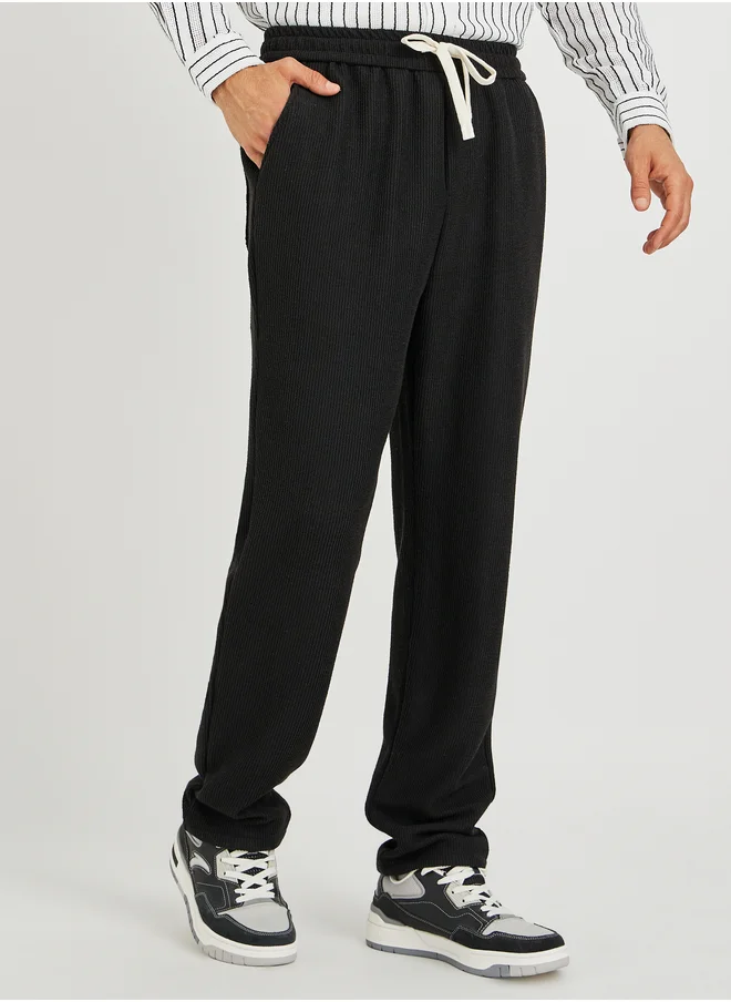 ستايلي Styli Men Textured Straight Fit Joggers with Drawstring