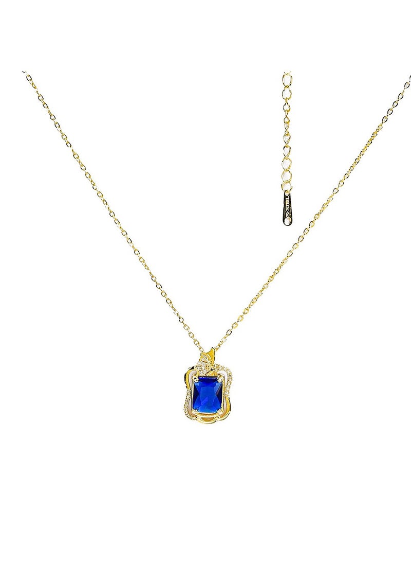 FLUFFY - Timeless elegance shines through in this gold necklace, studded with radiant zircon and a colorful gem - Image 1