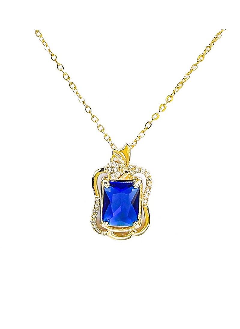 FLUFFY - Timeless elegance shines through in this gold necklace, studded with radiant zircon and a colorful gem - Image 1