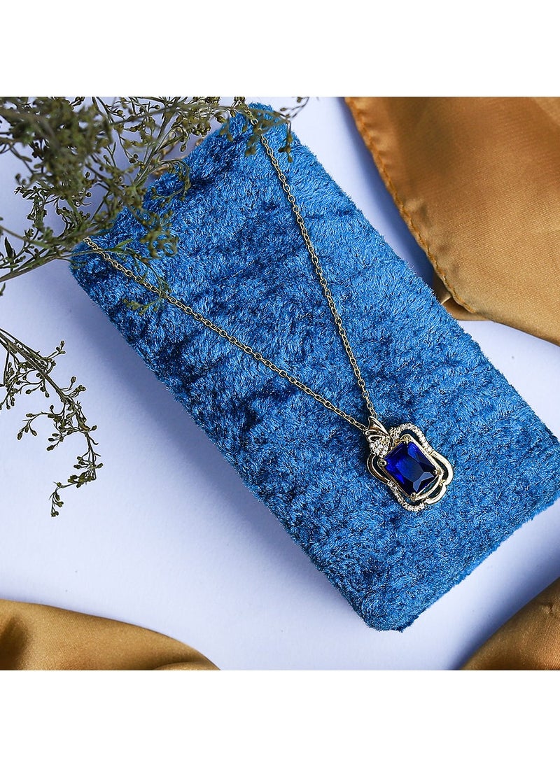 FLUFFY - Timeless elegance shines through in this gold necklace, studded with radiant zircon and a colorful gem - Image 1