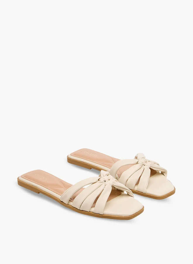Celeste Women Textured Flat Sandals