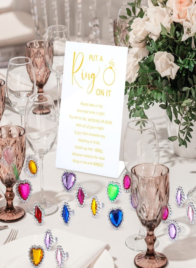 Woanger Put a Ring on It Game with 100 Pcs Fake Rings, Plastic Rings for Bridal Shower Game, Acrylic Sign for Guests Engagement Wedding Decoration - Image 5