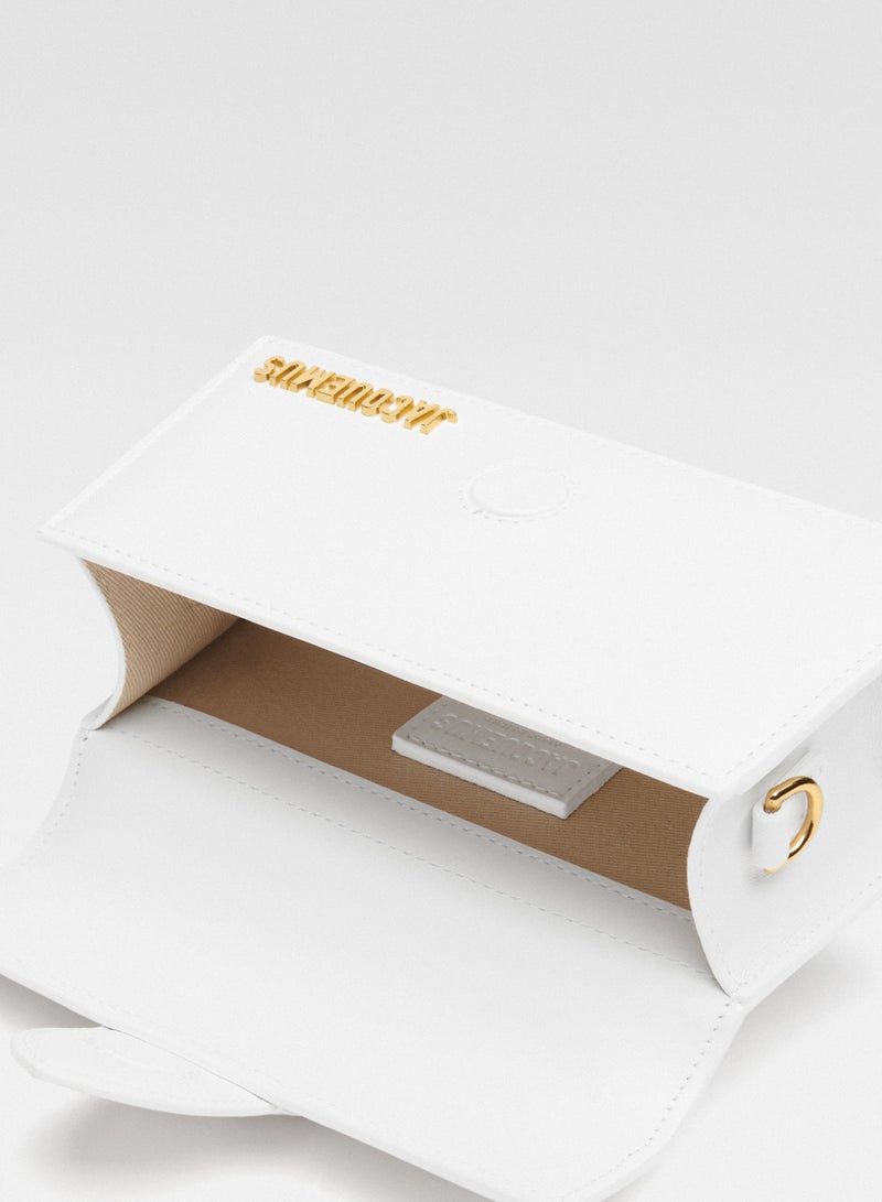 JACQUEMUS حقيبة بامبينو ذات الفلابة مع حزام قابل للفك، حقيبة يد نسائية، حقيبة كتف نسائية، حقيبة توت نسائية، حقيبة سفر نسائية، لامعة-بيضاء-17سم - Image 5