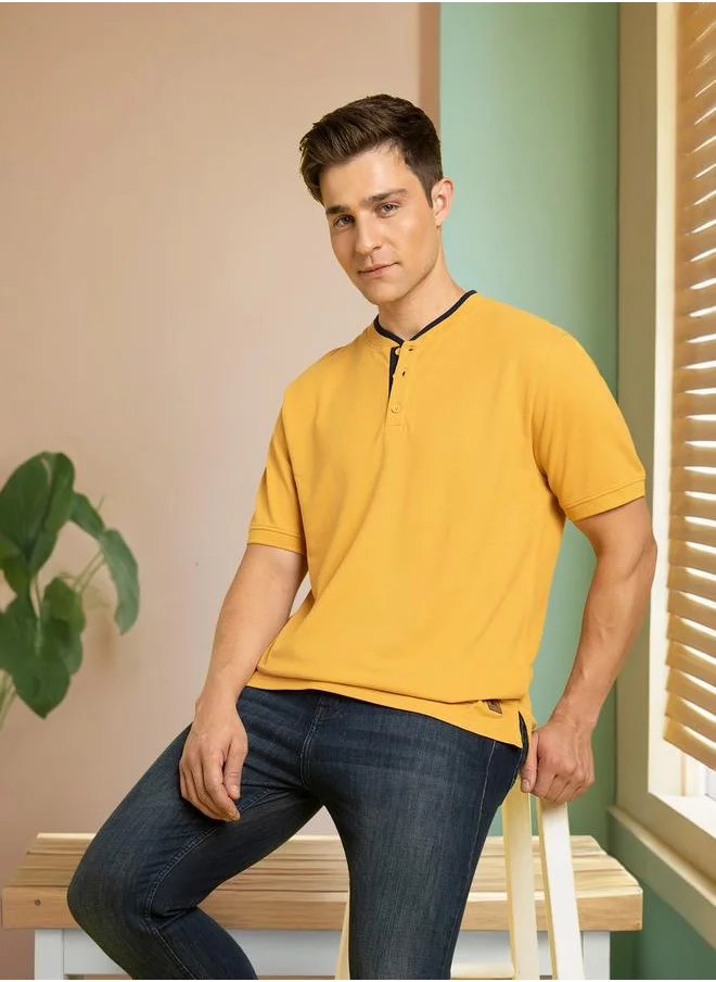 Dennis Lingo Stylish Amber Gold Henley T-Shirt for Men featuring a regular fit with rib overlap Henley collar, crafted from premium pique fabric for a sleek and comfortable look—perfect for everyday wear.