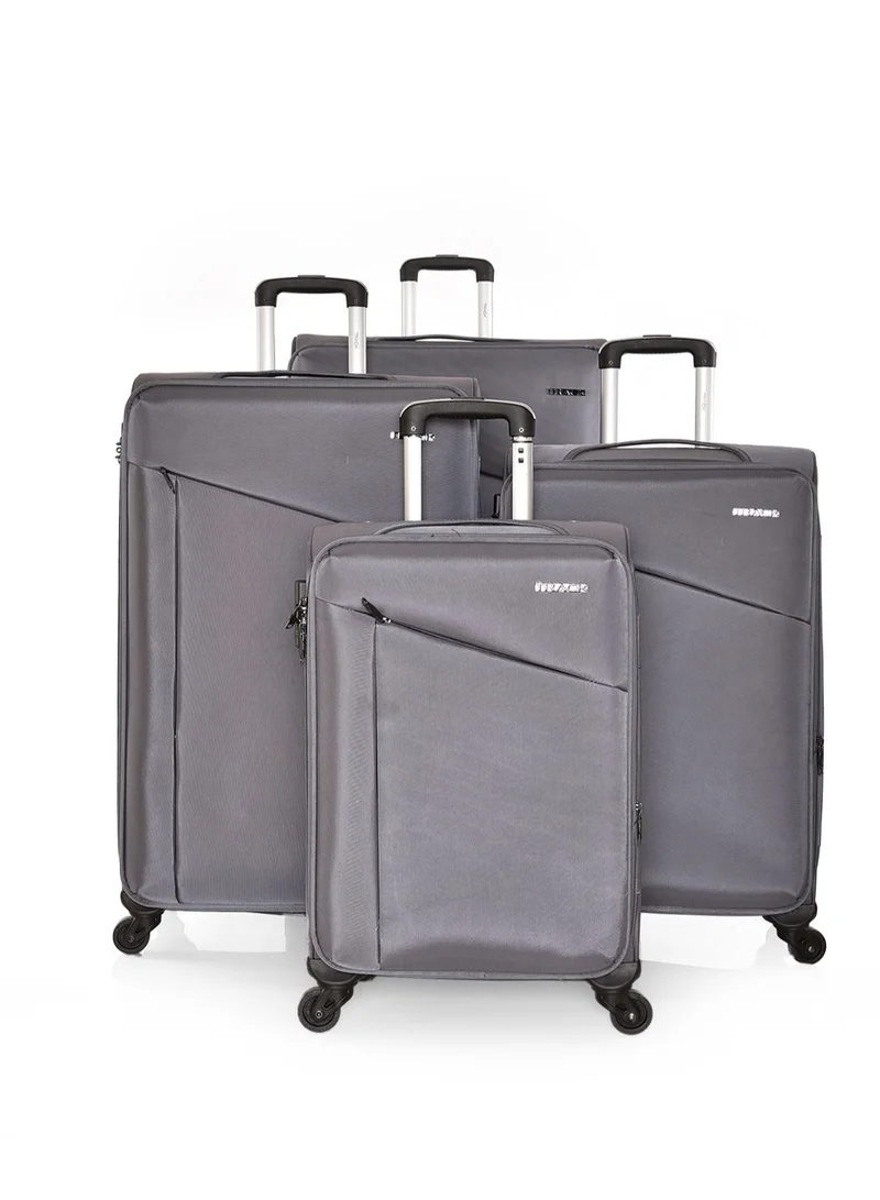 تراك طقم حقائب سفر 4 قطع ماركة تراك قماش مقاس 32/28/24/20 بوصة بأربع عجلات دوارة، رمادي.