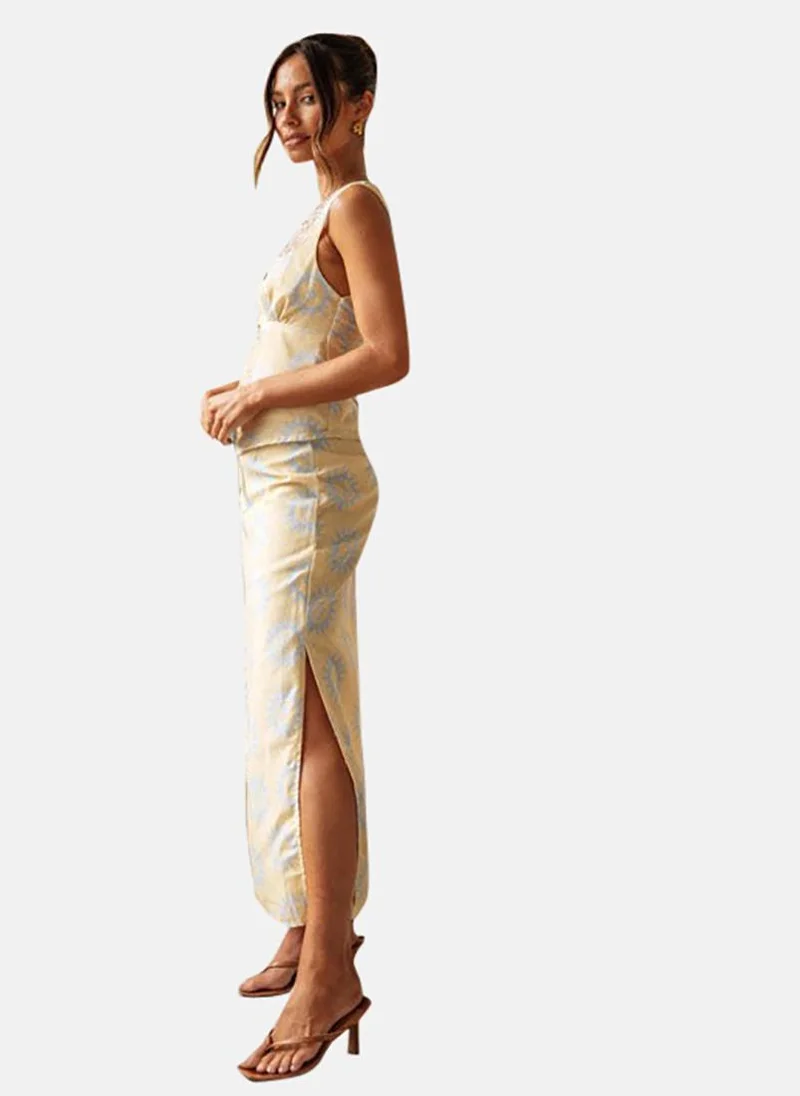 يونيكي Yellow Printed Sleeveless Top With Skirt