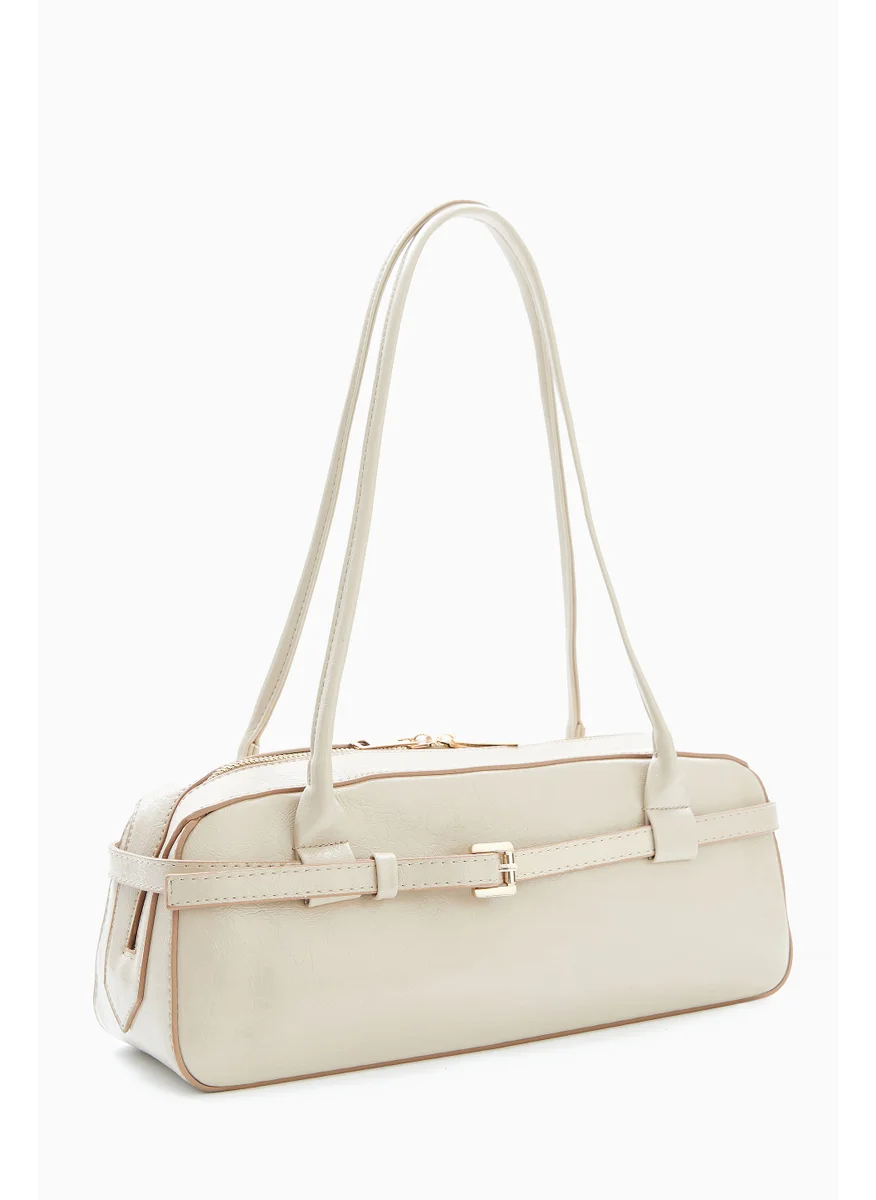 Wecre8 Beige Elongated Shoulder Bag by WECRE8