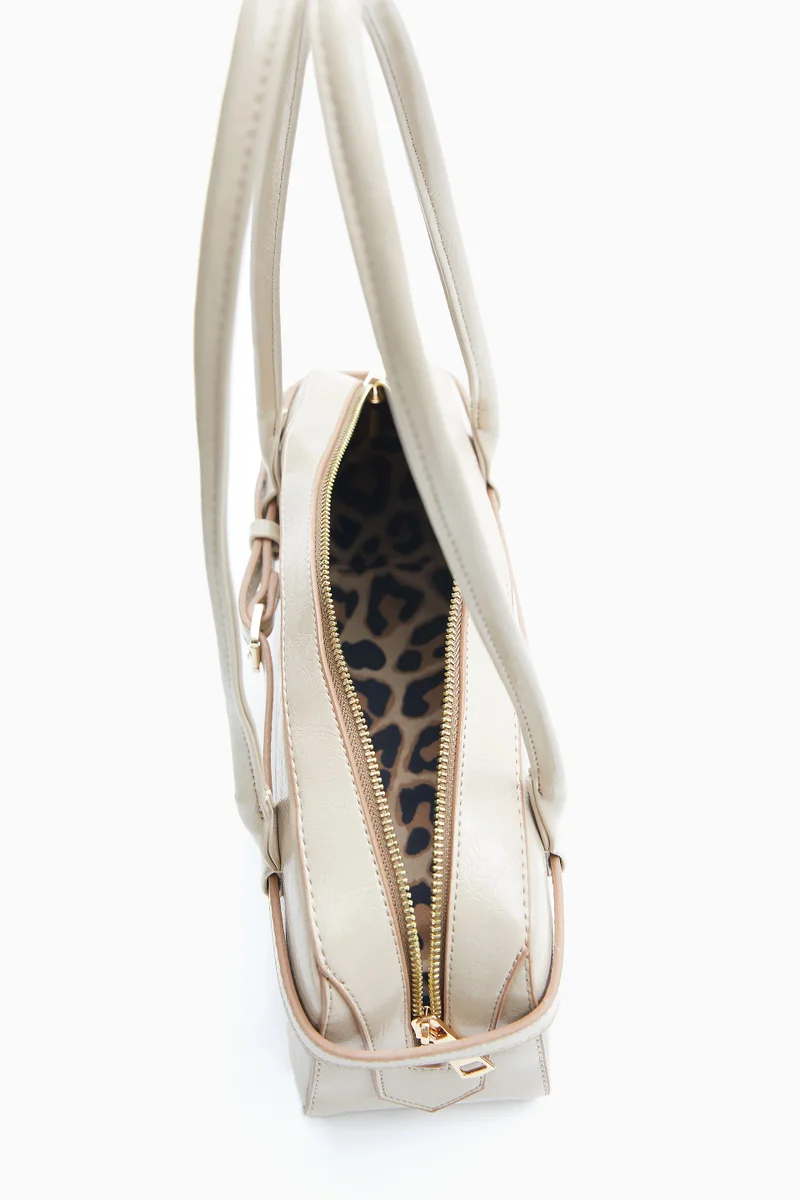 Wecre8 Beige Elongated Shoulder Bag by WECRE8
