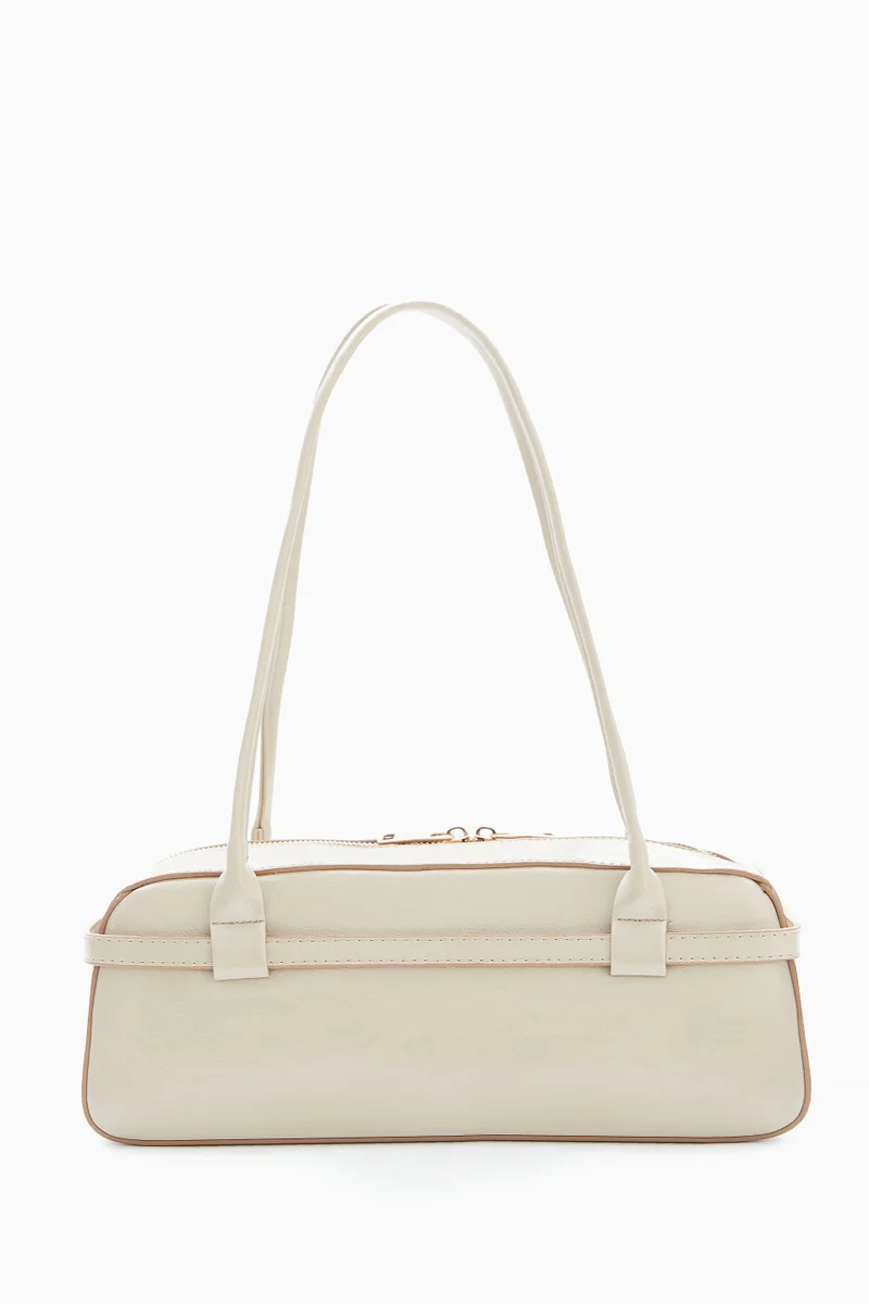 Wecre8 Beige Elongated Shoulder Bag by WECRE8