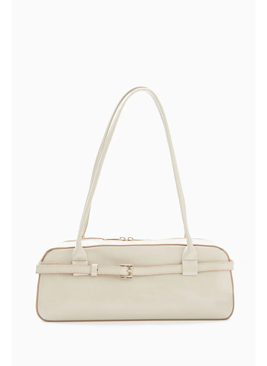 Wecre8 Beige Elongated Shoulder Bag by WECRE8