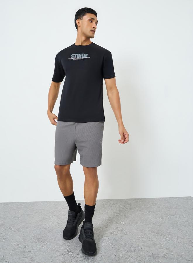 Styli Active Men Oversized Slogan Print T-Shirt - Image 4