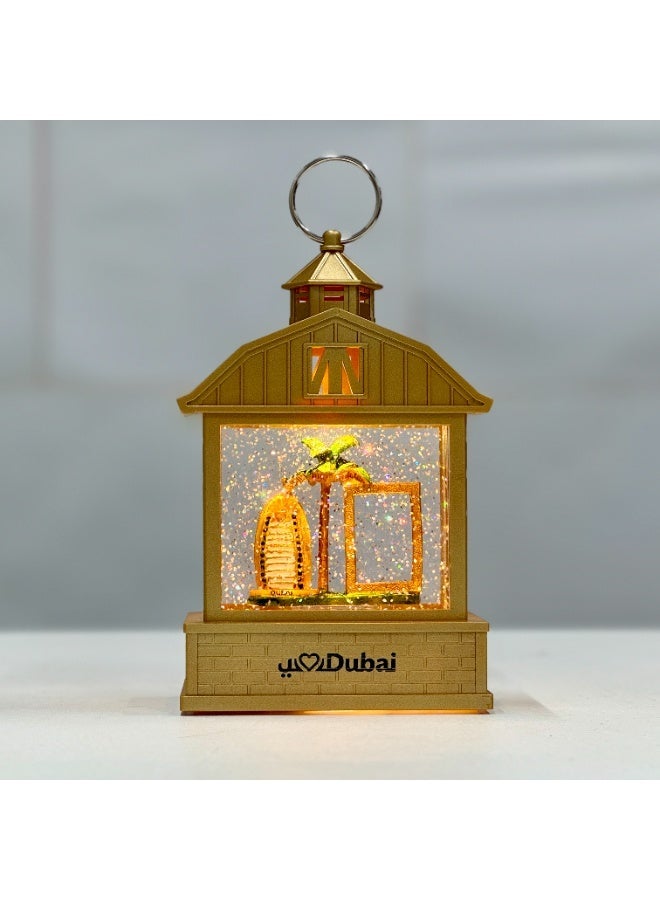فانوس دبي الذهبي بإضاءة LED يعمل بالبطارية وUSB ديكور رمضان هدية عيد ديكور إسلامي تذكار سياحي فندق برج العرب مع نخلة وإطار ذهبي كرة ثلجية بريق متحرك مصباح ليلي للطاولة للمنزل والمكتب - Image 1