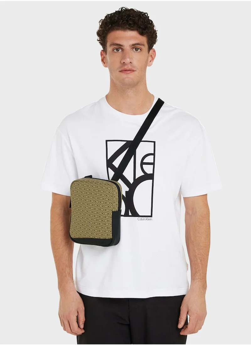 CALVIN KLEIN Rubberized Conv Reporter Mono Bag