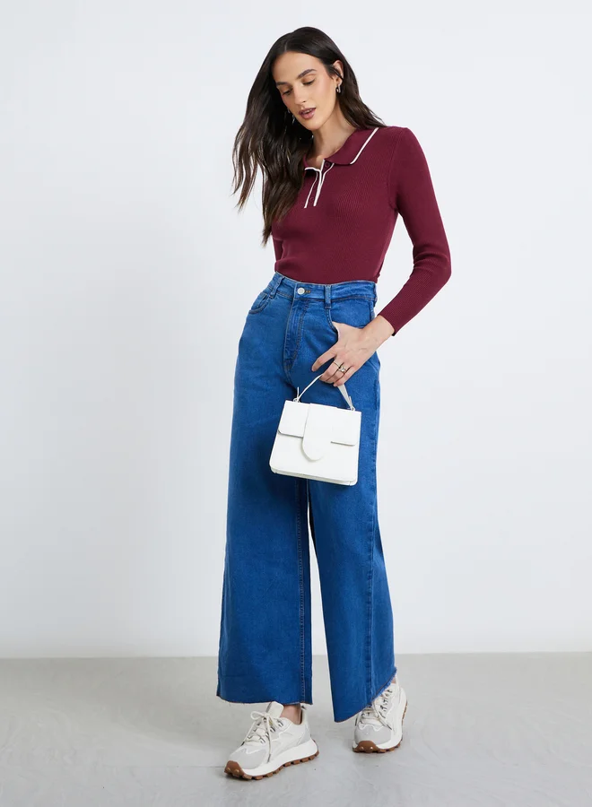 ستايلي بلوزة بياقة بولو وأكمام طويلة