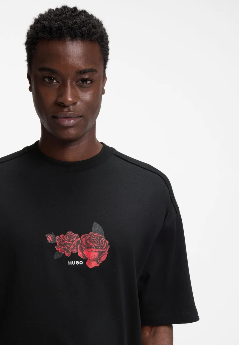 HUGO Black Oversized-fit cotton T-shirt with biker and roses graphic for Men | Best Price UAE
