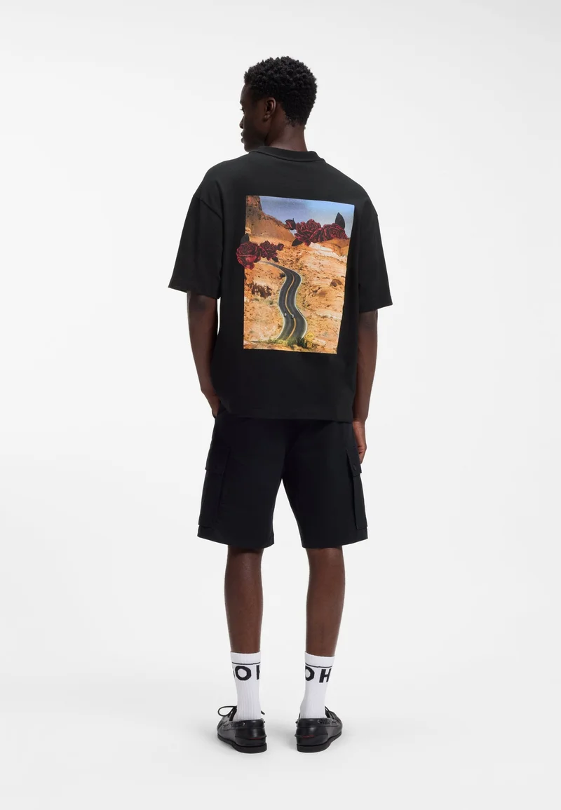 HUGO Oversized-fit cotton T-shirt with biker and roses graphic
