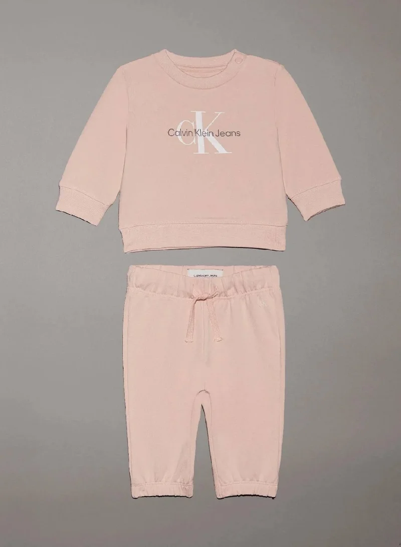 كالفن كلاين جينز بدلة رياضية للأطفال حديثي الولادة مزينة بشعار كلفن كلاين