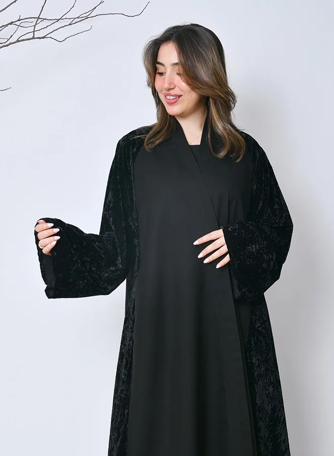 HAWRAA ABAYA Luxurious black winter velvet abaya – an elegant design from Hawraa Abayas