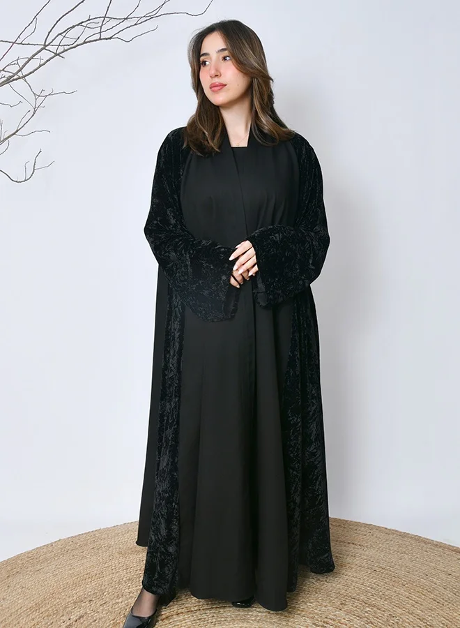 HAWRAA ABAYA Luxurious black winter velvet abaya – an elegant design from Hawraa Abayas