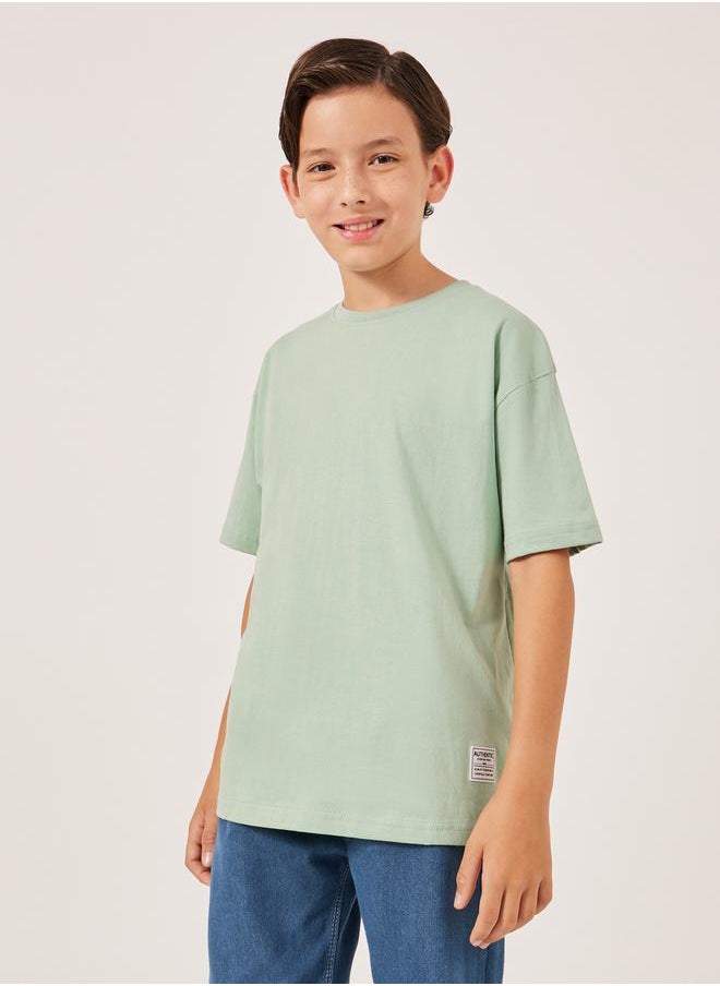 Styli Solid Oversized T-Shirt with Badge Detail  - Image 1