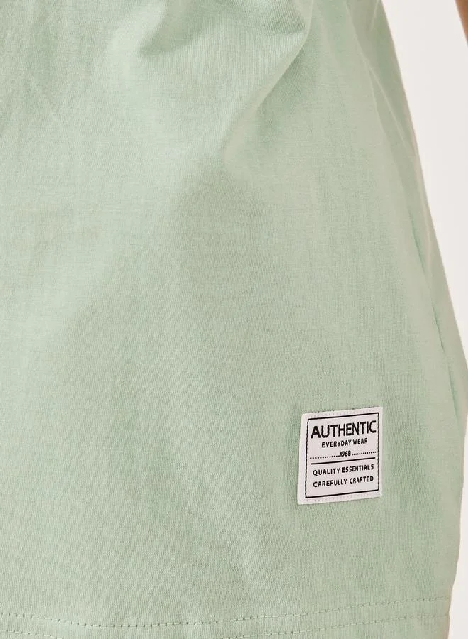 Styli Solid Oversized T-Shirt with Badge Detail