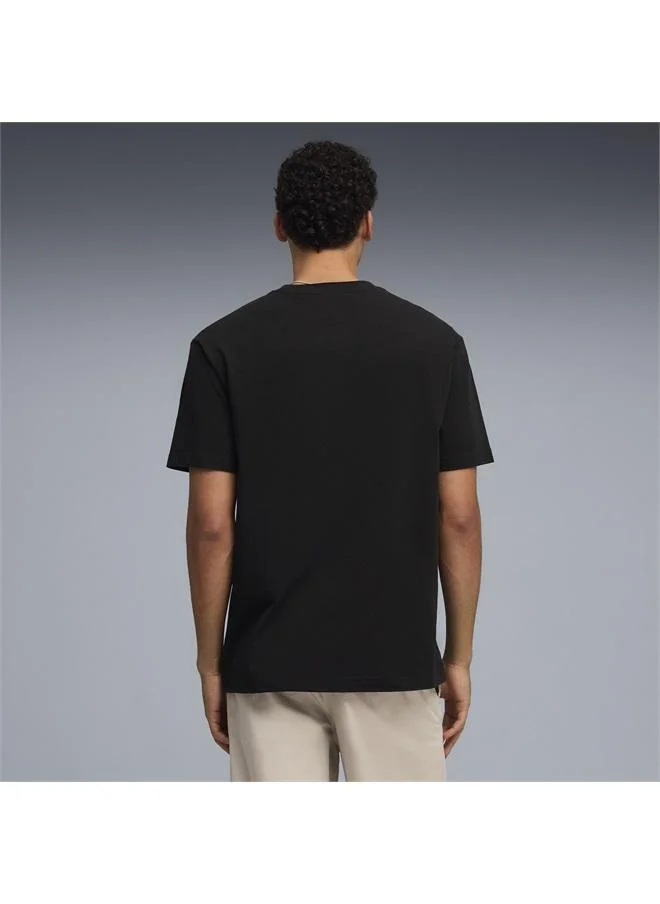 بوما تيشرت Essentials واسع ومزين بشعار PUMA Cat المطوّر للرجال