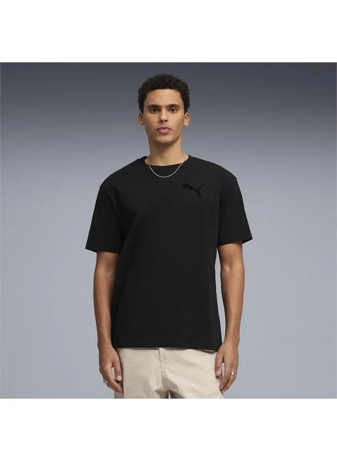 بوما تيشرت Essentials واسع ومزين بشعار PUMA Cat المطوّر للرجال