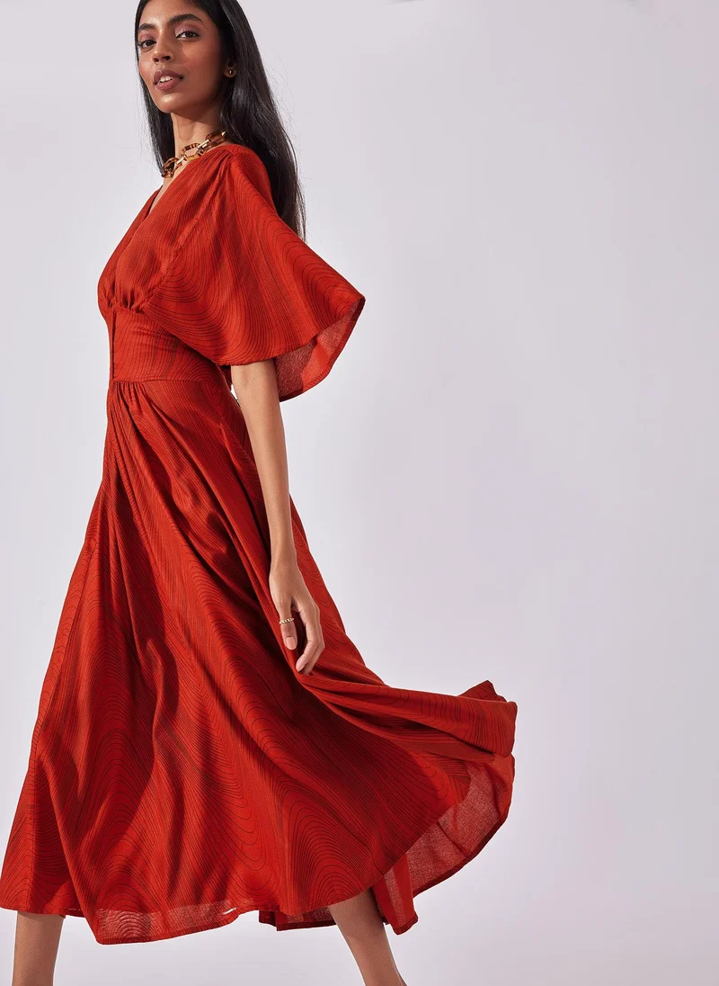 The Label Life Rust Wave Graphic Print Midi Dress – Chic & Flowy