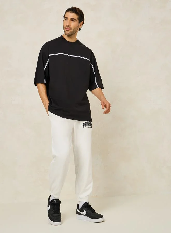 ستايلي Embroidered City Name Relaxed Terry Jogger