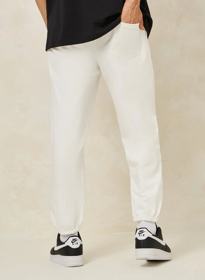 ستايلي Embroidered City Name Relaxed Terry Jogger