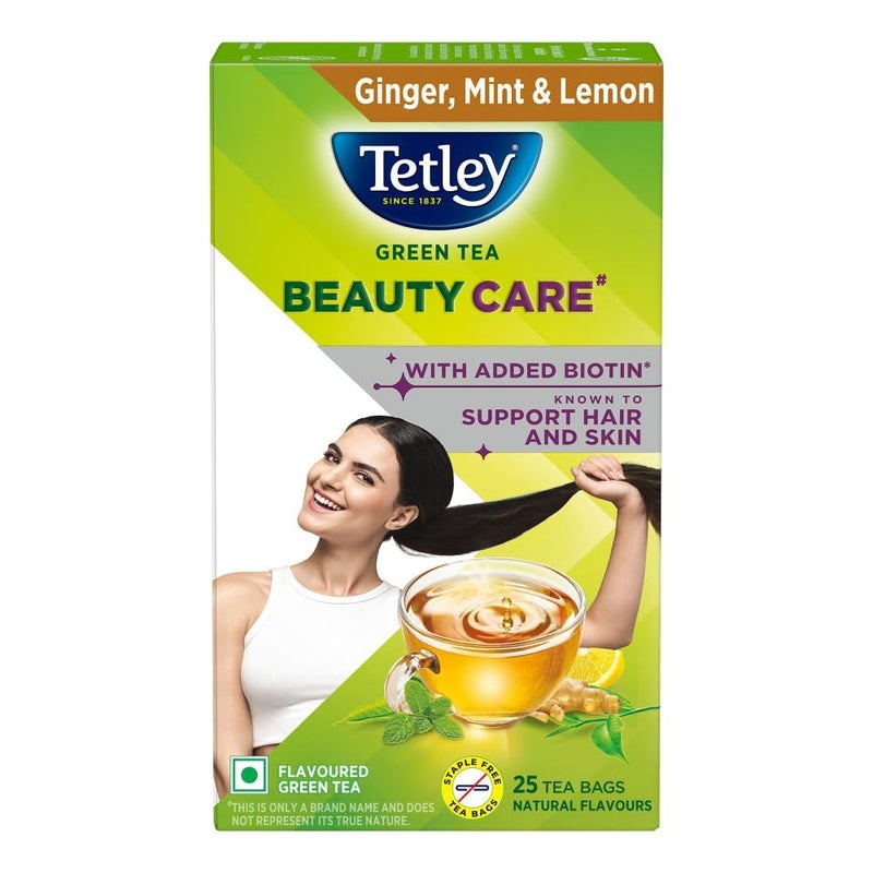 Tetley شاي تيتلي الأخضر للعناية بالجمال، مع البيوتين المضاف، يدعم الشعر والبشرة، 0 سعرات حرارية، نكهات الزنجبيل الطبيعي، النعناع والليمون، 25 كيس (1.7 جرام لكل منها) - Image 1