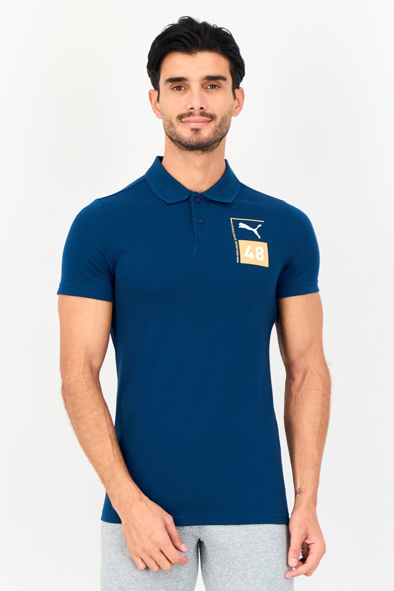 PUMA Men Slim Fit Short Sleeve Outdoor Polo Shirt, Teal Blue - Image 1