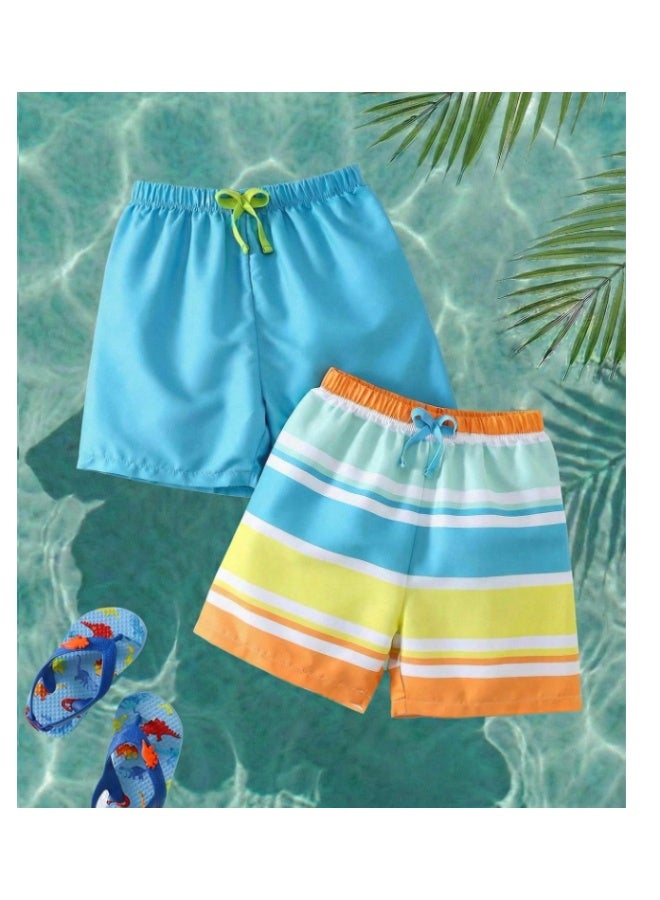 Printed shorts swimsuit for little boys in light blue and multicolored, featuring striped and solid patterns and stretchy fabric, suitable for summer (6 years) - Image 1
