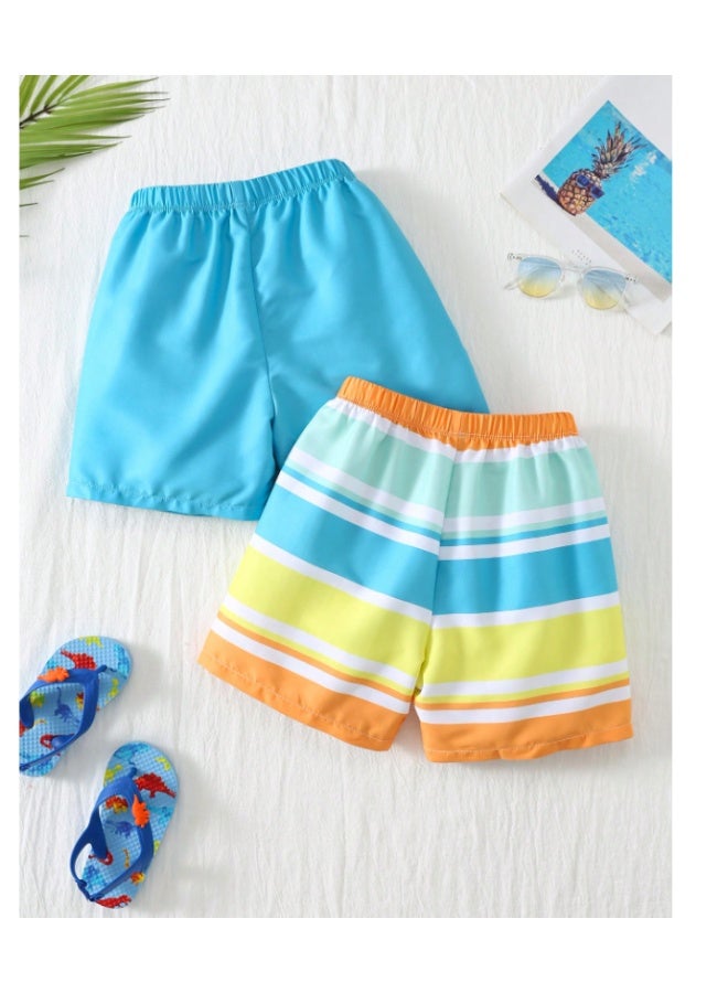 Printed shorts swimsuit for little boys in light blue and multicolored, featuring striped and solid patterns and stretchy fabric, suitable for summer (6 years) - Image 2